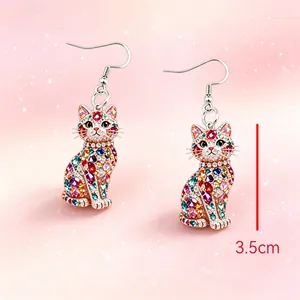 Detailed close-up view of colorful cat shaped acrylic earrings with 3.5cm size reference.