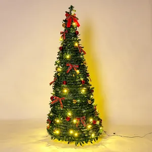 Full view of a luxury pre-lit collapsible green Christmas tree with warm lights