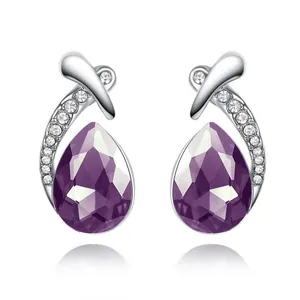 Elegant purple pear-shaped crystal stud earrings with silver setting and sparkling accents