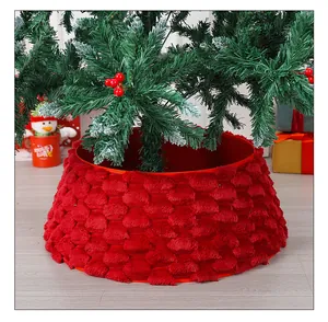 Detailed view of red plush Christmas tree collar with textured diamond pattern