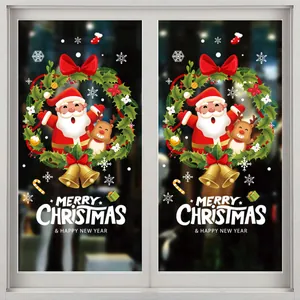 Festive Christmas window stickers featuring Santa Claus and reindeer on a glass pane