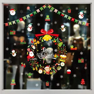 Large festive Christmas window static stickers featuring a wreath, Santa and snowflakes.