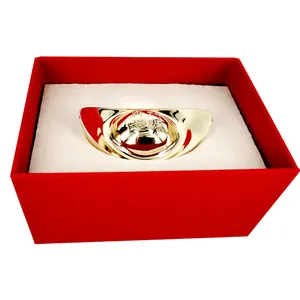 Solid copper gold sycee wealth ornament presented in a premium red velvet gift box