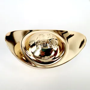 Detailed macro view of a solid copper gold ingot with traditional wealth engraving