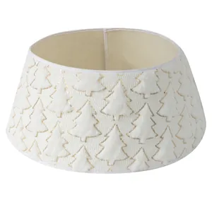 Cache-pied de sapin en peluche blanche avec motifs sapins en paillettes dorées