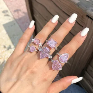 Bague en argent massif S925 avec zircons roses étincelants de différentes tailles