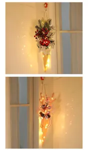 Detail of glowing Christmas ice cream cone wall decoration with warm LED lights