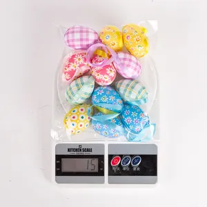 Detailed weight measurement showing a pack of 12 fabric-covered foam Easter eggs