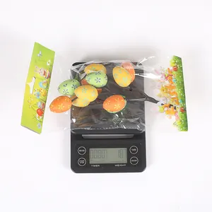 Detailed weight measurement of Easter printed egg decorative branches on a digital scale.