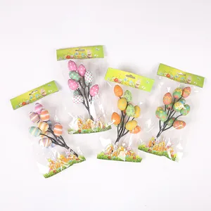 Set of 4 colorful Easter egg branches with floral patterns for festive tabletop decor