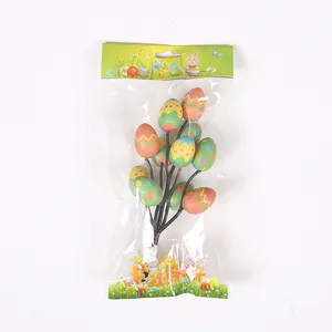 Close-up of artificial Easter egg floral picks decoration in a clear printed packaging bag