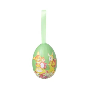 Close-up detail of a green foam Easter egg ornament featuring a vintage rabbit print.