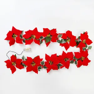 LED-Weihnachtsstern-Girlande mit roten Beeren und Batteriefach für die Feiertagsdekoration