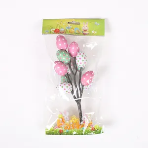 Packaged Easter egg branch decoration featuring colorful polka dot printed eggs