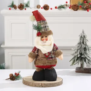Detailed view of handcrafted Christmas Santa plush doll with plaid outfit for holiday decor