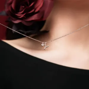 Close-up of S925 sterling silver necklace with letter Y pendant and stone