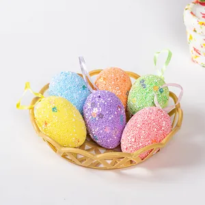 Set of six colorful textured foam Easter eggs with floral patterns and hanging ribbons