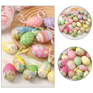 Colorful painted Easter foam eggs with hanging loops for festive party decoration