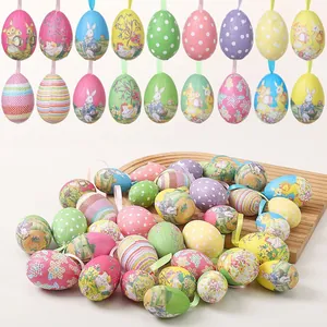 Detailed view of colorful Easter painted foam eggs with various patterns and hanging ribbons