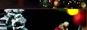 Close-up of festive Christmas decorations with mini cedar trees and warm bokeh lights