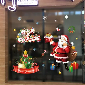 Festive Christmas window stickers featuring Santa Claus and decorated Christmas tree decals