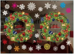 Detailed view of Christmas window stickers featuring festive wreaths and snowflakes