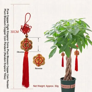 Traditional Chinese plum blossom copper coin pendant with red tassel, 30cm length