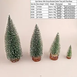 Set of five mini snow-tipped tabletop Christmas trees with wooden bases, varied sizes