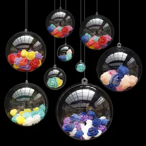 Set of clear hanging plastic balls in various sizes filled with colorful decorative foam roses