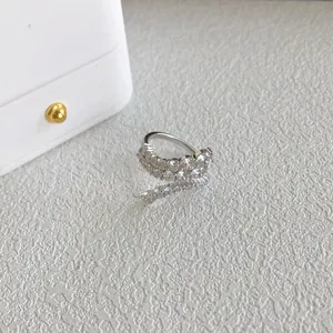 Macro view of a French style S925 silver ring with multi-row sparkling zircons