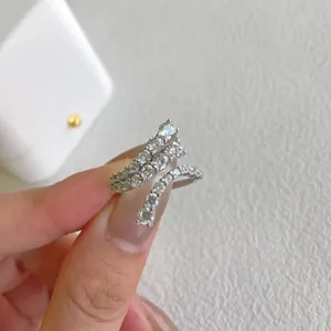 Close-up of elegant S925 sterling silver ring with shimmering cubic zirconia stones