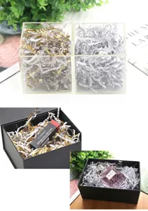 Macro detail view of gold and silver pleated shredded paper silk as gift box filler