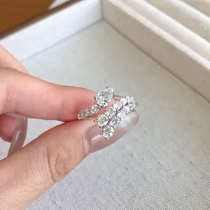 Close-up of S925 sterling silver ring with pear and round cubic zirconia stones