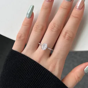 Close-up of S925 silver ring with oval cut ice flower zircon on hand