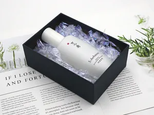 Close-up detail of iridescent shredded film filler used in luxury gift box packaging
