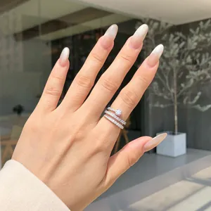 Detail showing sparkling S925 sterling silver ring with cubic zirconia on a model's hand