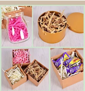 Detail view of colorful pleated wave shredded paper filler for gift box packaging décor