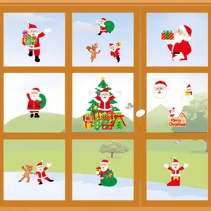 Detailed display of colorful Christmas static window stickers on a clear glass pane