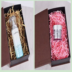 Close-up detail of premium colored shredded crinkle paper filler for elegant gift boxes