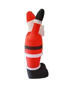 Side view detail of a large inflatable Santa Claus outdoor Christmas decoration