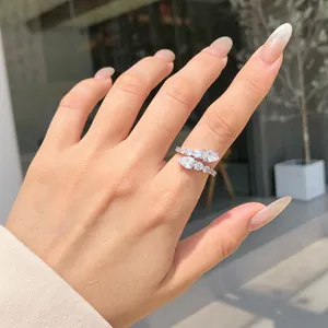 Close-up detail of an elegant S925 sterling silver wrap ring with sparkling cubic zirconia