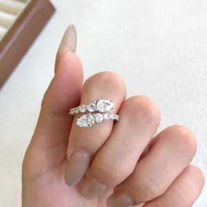 Detailed macro shot of an S925 sterling silver ring with pear-cut cubic zirconia stones