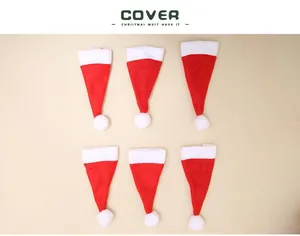 Set of six mini red and white Christmas hats for cutlery or bottle decor