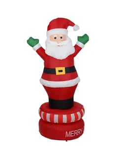 Macro view of large inflatable Santa Claus decoration standing on a festive red base