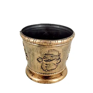 Support de sapin de Noël décoratif en plastique bronze avec un relief de bonhomme de neige