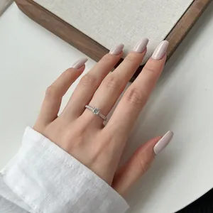 Elegant S925 sterling silver solitaire ring on model finger for wedding engagement