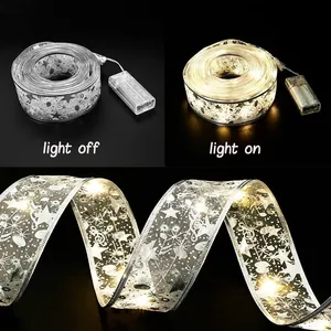 Detailed close-up of LED Christmas ribbon lights with star patterns for decoration.