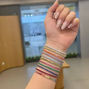 Colorful cubic zirconia stretch bracelets in 925 sterling silver worn on a female wrist