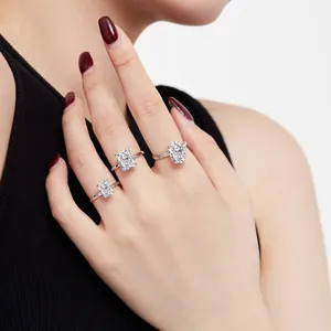 Close-up of S925 silver rings with various ice-cut cubic zirconia stones on model