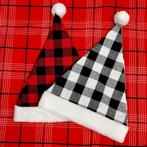 Detailed view of red and white buffalo plaid Christmas hats with soft plush trim.